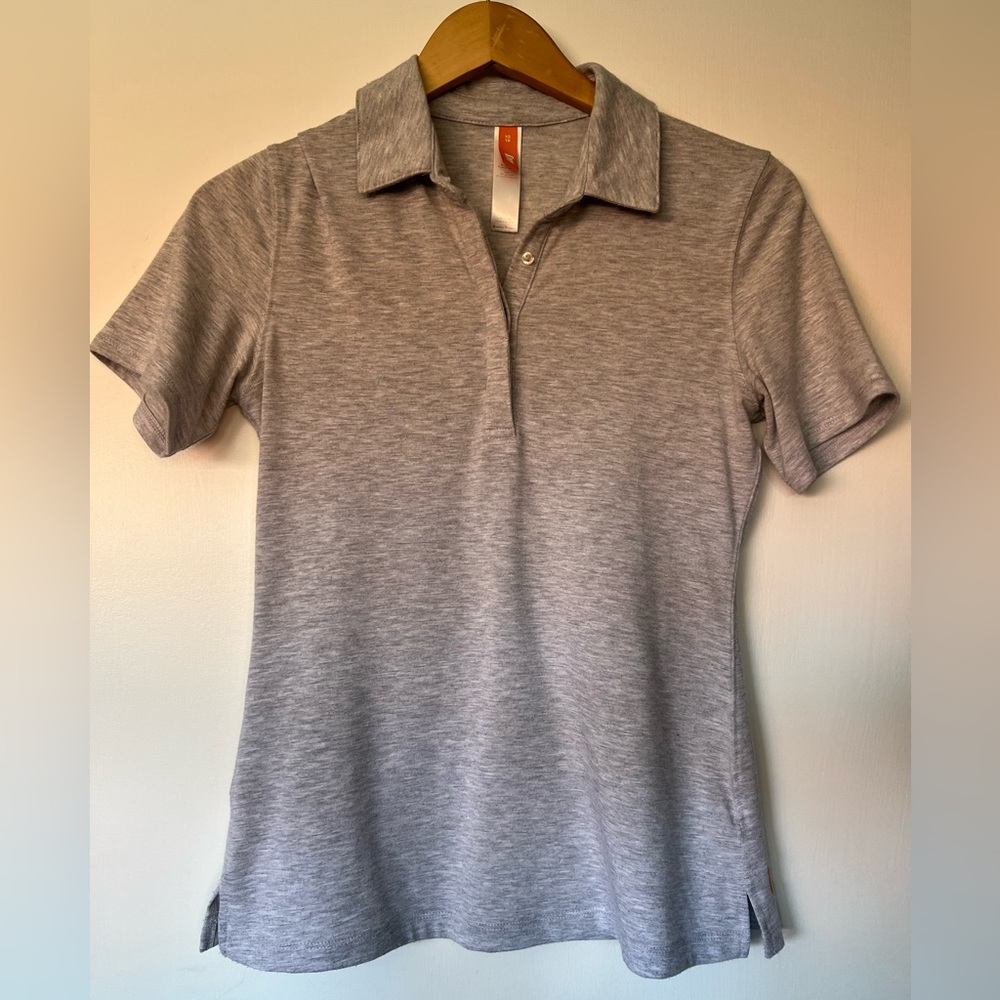 Light gray polo shirt by Lucy in size xsmall